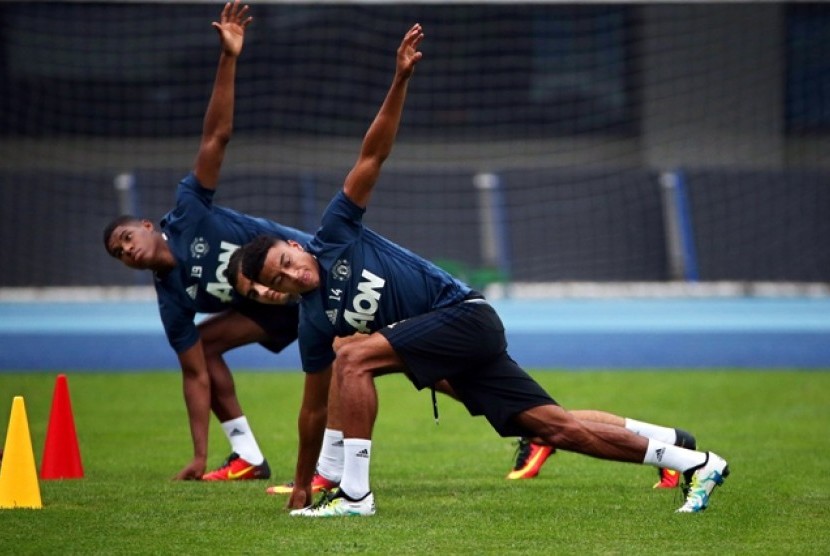 Marcus Rashford (kiri) dan Jesse Lingard dalam sebuah sesi latihan Manchester United pada Juli 2016. Keduanya dipanggil masuk skuat timnas Inggris.