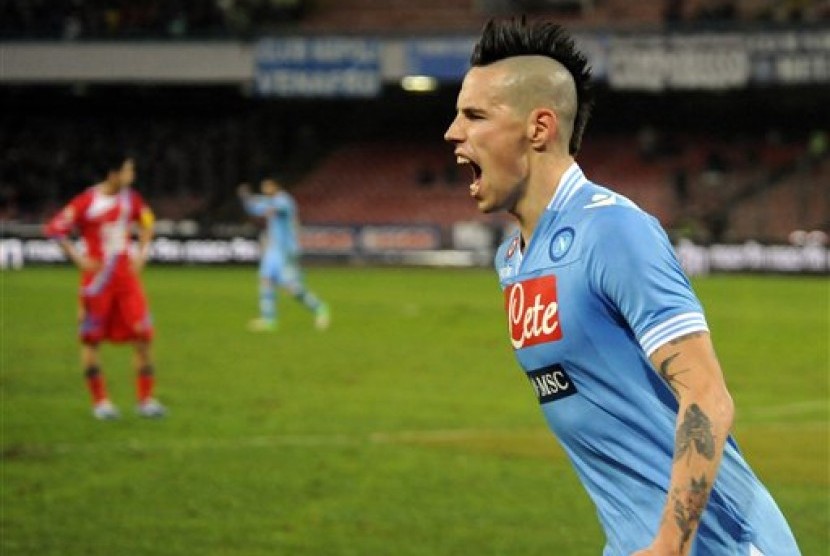 Marek Hamsik usai mencetak gol ke gawang Catania.