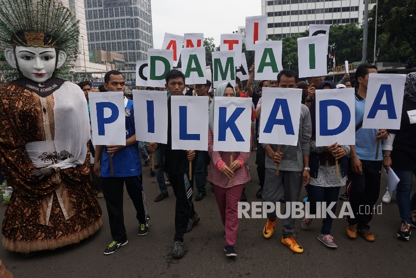 Massa dari Koalisi Pilkada Damai Tanpa Kecurangan (KPD-TK) melakukan aksi simpatik mendukung agar pilkada berlangsung damai tanpa kecurangan (ilustrasi) 