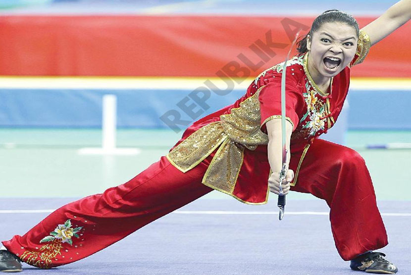 Medali Pertama.Atlet wushu Juwita  Niza Wasni menyumbangkan medali pertama bagi kontingen indonesiadi arena Asian Games 2014 Incheon ,Korea Selatan, Sabtu (20/9).