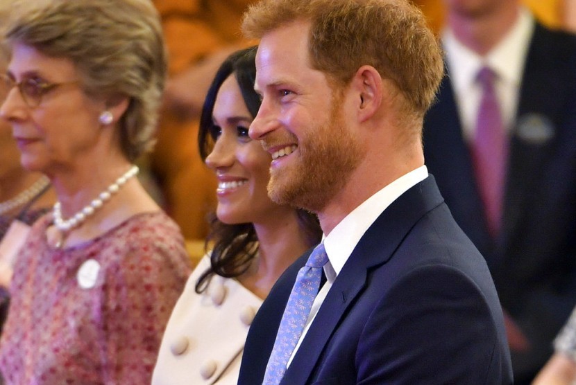 Meghan Markle dan Pangeran Harry dalam acara The Young Leaders Reception di Istana Buckingham di London, 26 Juni 2018.