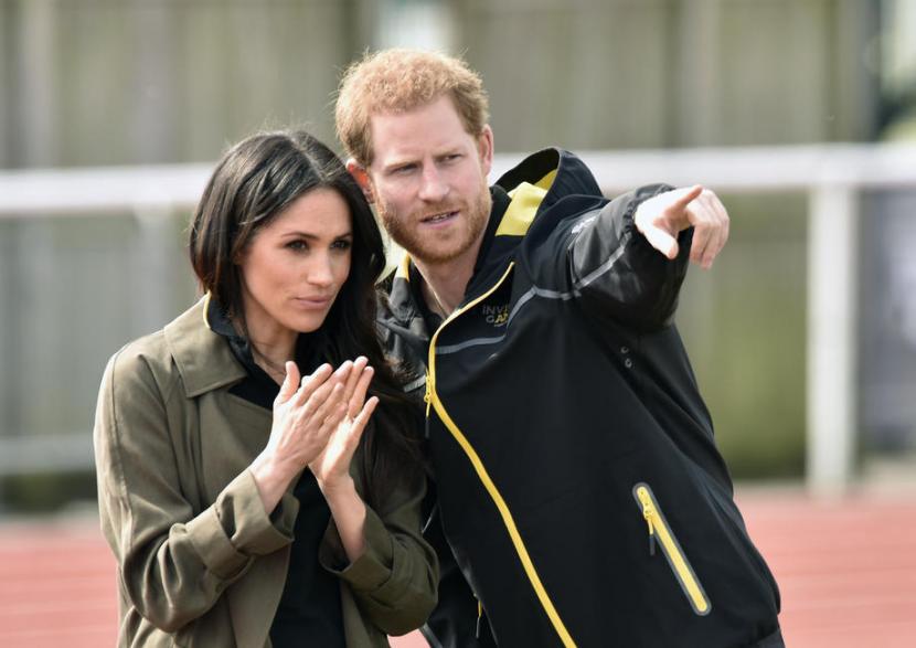 Pangeran Harry dan istrinya Meghan Markle. Keduanya berkunjung ke Inggris untuk kali pertama sejak mereka mundur dari tugas kerajaan pada Maret 2020. 