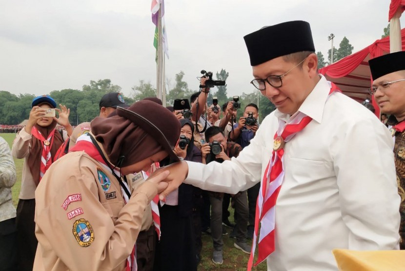 Menteri Agama Lukman Hakim Syaifuddin menghadiri dan membuka secara resmi Perkemahan Pramuka Madrasah DKI Jakarta di Buperta Cibubur, Rabu (28/11).