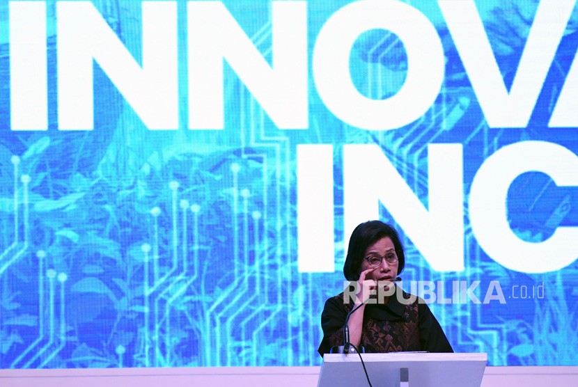 Menteri Keuangan Sri Mulyani Indrawati memberikan paparan pada Indonesia Fintech Summit & Expo 2019 di Jakarta Convention Center (JCC), Jakarta, Senin (23/9/2019).