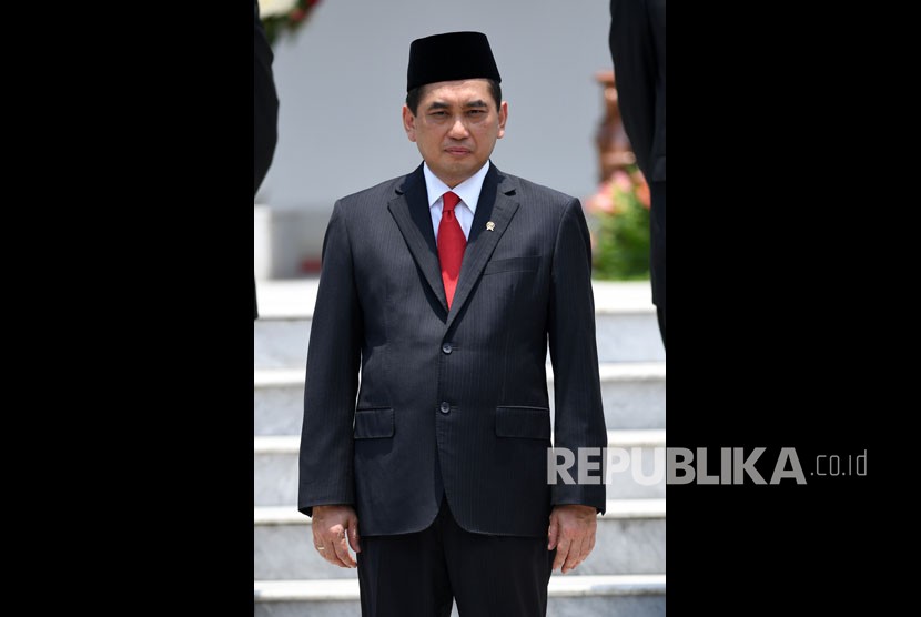 Menteri Perdagangan Agus Suparmanto bersiap mengikuti foto bersama seusai pelantikan menteri Kabinet Indonesia Maju di Beranda Istana Merdeka, Jakarta, Rabu (23/10/2019).