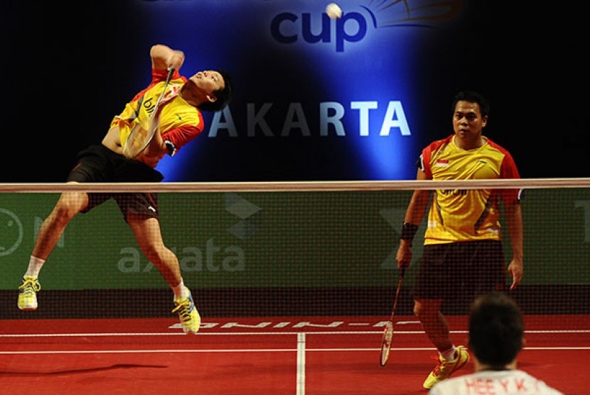 Meski ganda putra Indonesia Hendra Setiawan (kiri) dan Markis Kido memenangi pertandingan, namun tim bulu tangkin Indonesia tak meraih juara pertama