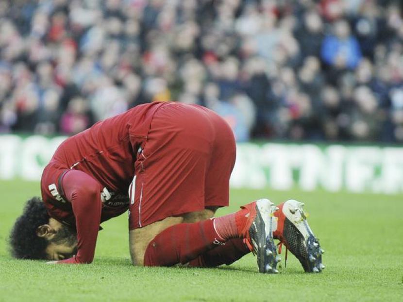 Mohammad Salah melakukan selebrasi cujus Syukur kala mencetak gol.
