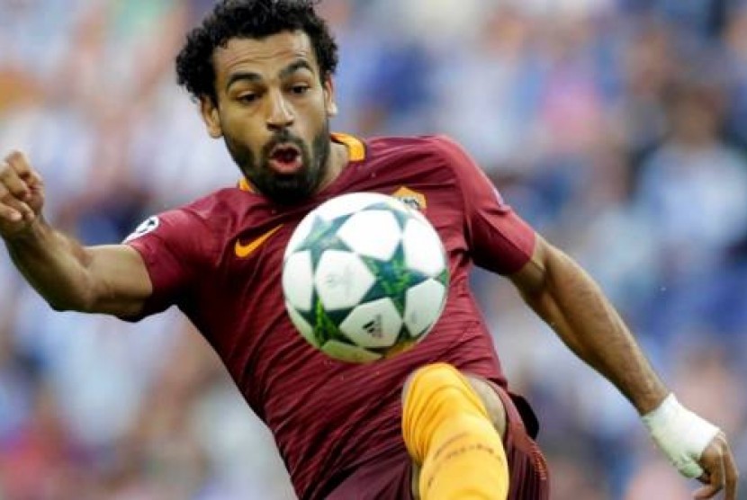 Mohammed Salah ikut mengantarkan AS Roma membantai Udinese 4-0, Ahad (21/8).