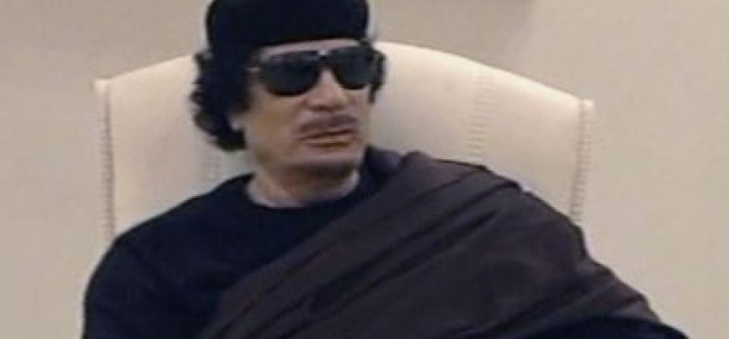 Muammar Qaddafi.