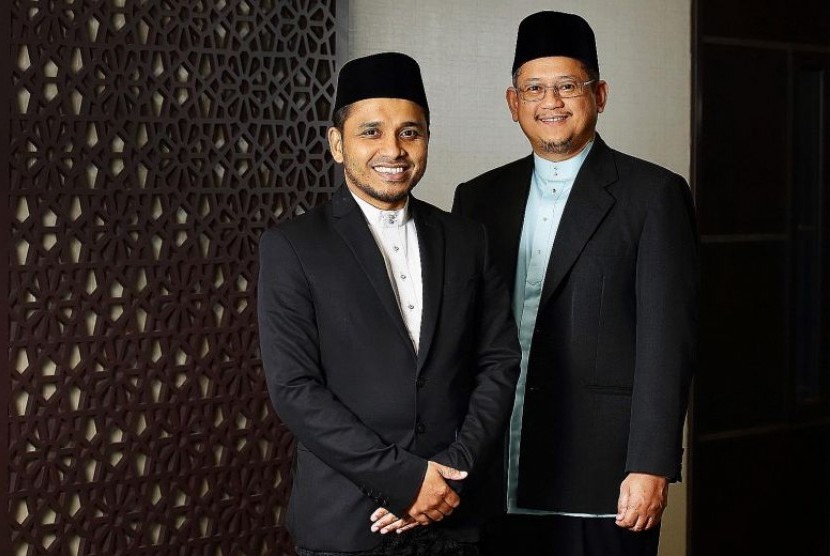 Muslim Singapura akan Miliki Mufti Baru. Mufti Mohamed Fatris Bakaram (kanan) akan diganti oleh wakilnya Nazirudin Mohd Nasir yang akan menjadi mufti baru di Singapura mulai 1 Maret 2020. 