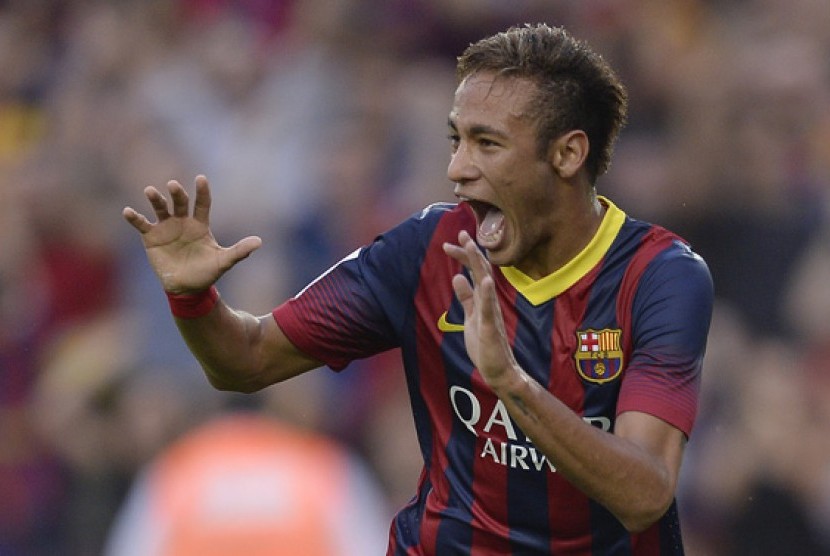 Neymar meluapkan kegembiraan usai menciptakan gol ke gawang Real Madrid