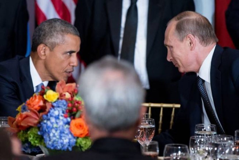 Obama dan Putin saat acara jamuan SIdang Umum PBB