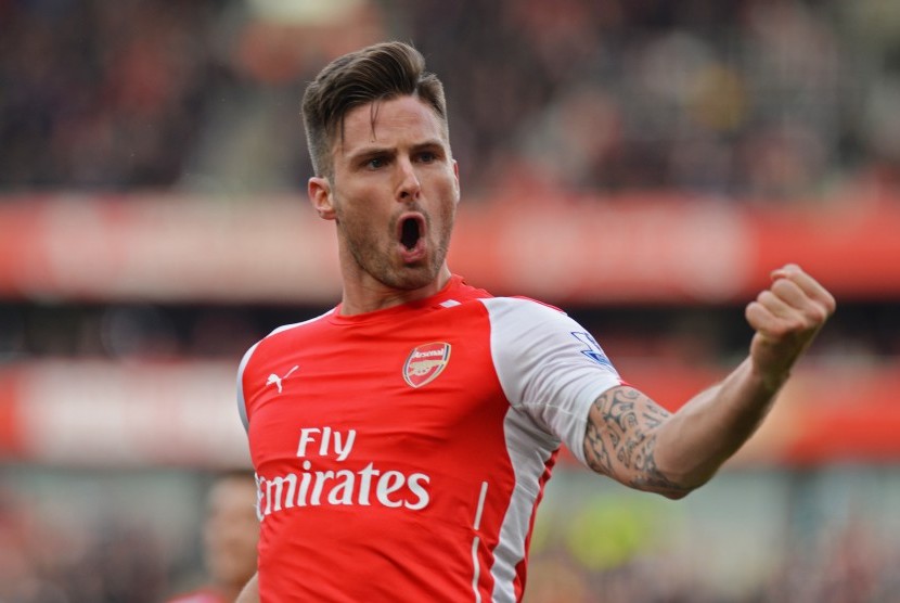  Olivier Giroud celebrates after scoring the first goal for Arsenal