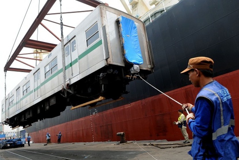 One of used Japanese coaches is unloaded from a cargo ship in Jakarta on Monday.  