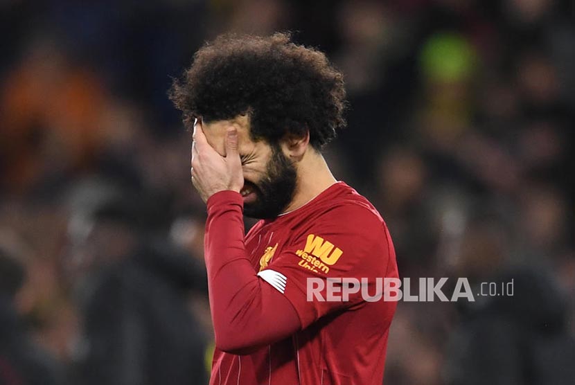 Reaksi Mohamed Salah pada akhir laga antara Watford melawan Liverpool di Watford, Inggris, Ahad (1/3) dini hari.