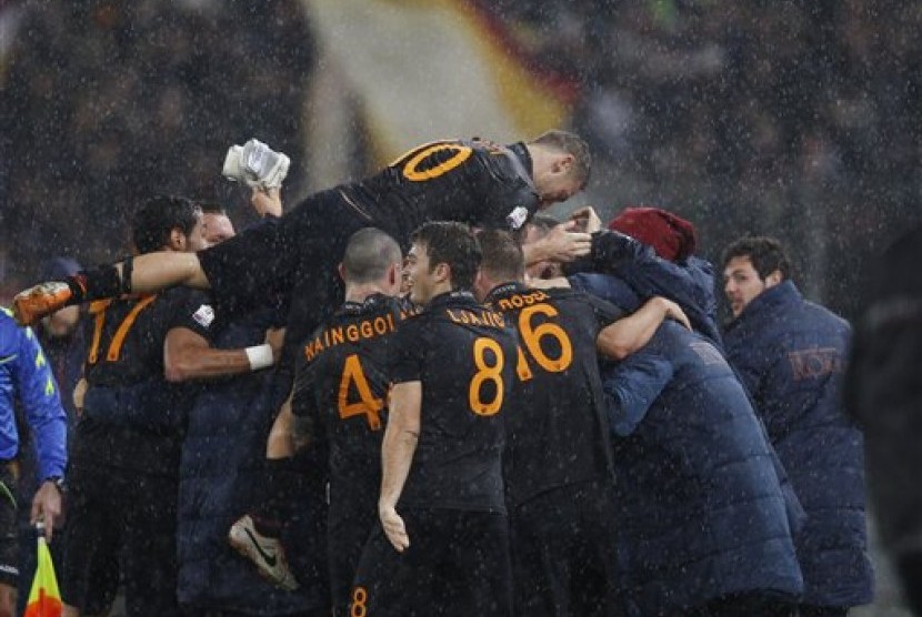 Para pemain AS Roma merayakan gol (ilustrasi).