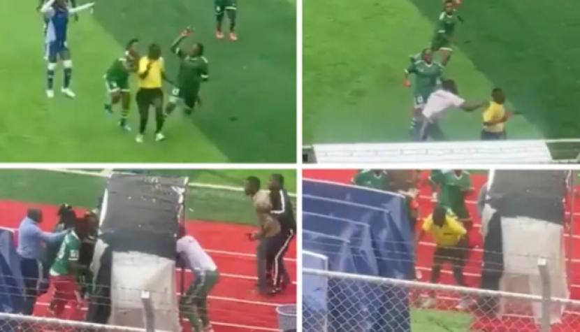 Para pemain DC Motema Pembe, sebuah tim sepak bola wanita di Republik Demokratik Kongo mengejejar dan memukuli wasit. 