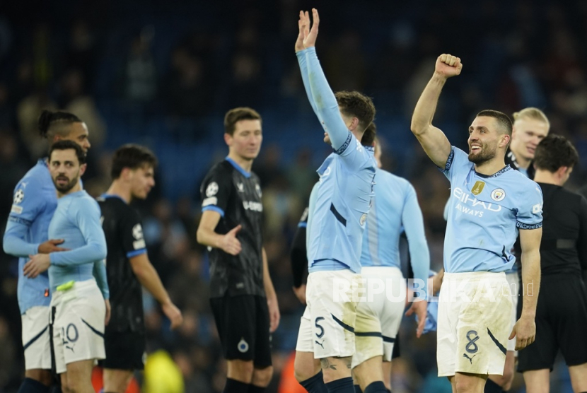 Para pemain Manchester City berselebrasi dalam pertandingan penyisihan Liga Champions melawan Club Brugge,