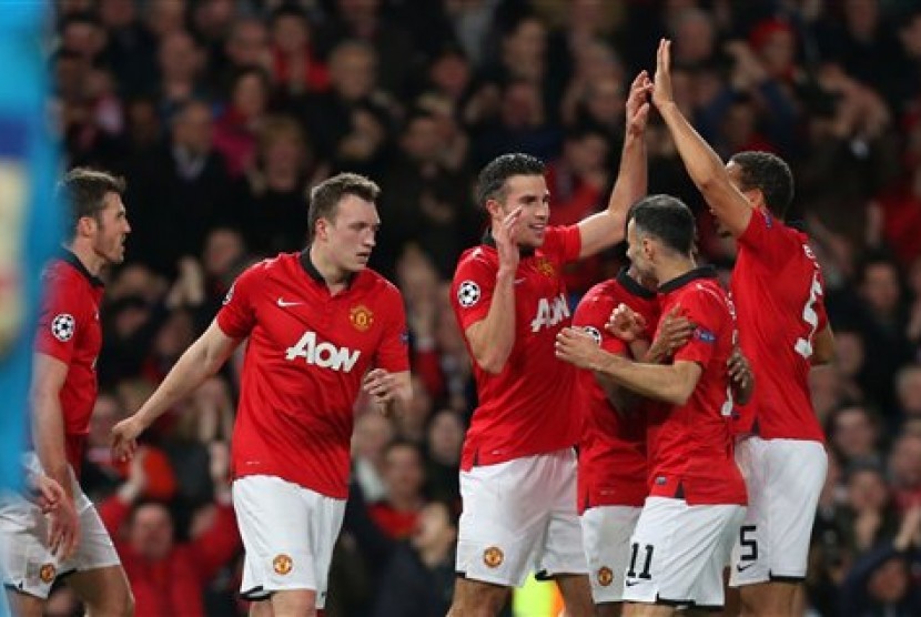 Para pemain Manchester United merayakan kemenangan di Liga Champions.