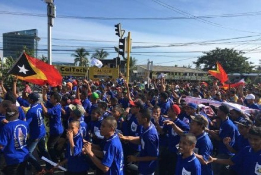 Para pengunjuk rasa ingin batas maritim permanen antara Australia dengan Timor Leste. 