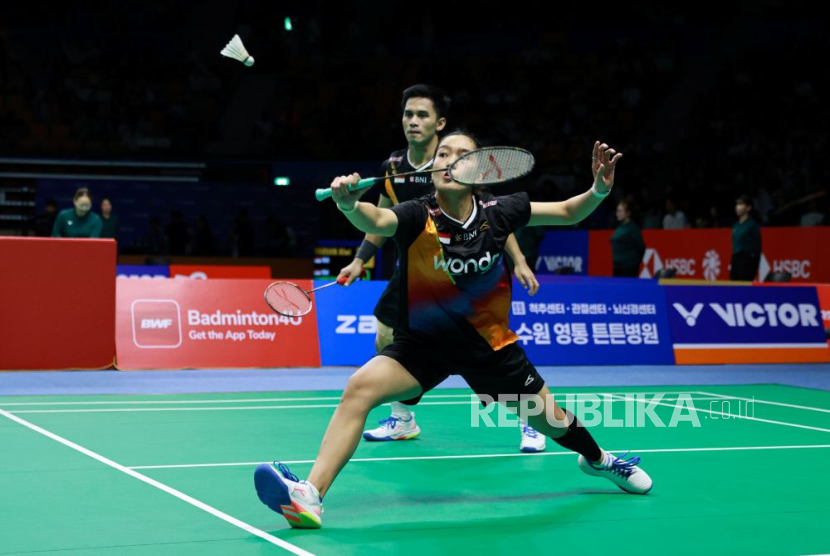Pasangan Amri Syahnawi/Nita Violina Marwah.