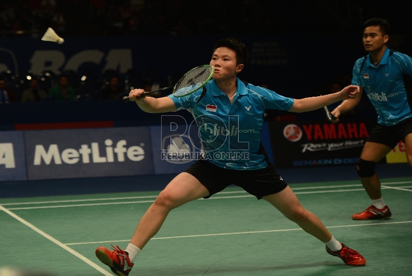 Pasangan ganda campuran Indonesia Tontowi Ahmad (kanan) dan Liliyana Natsir.