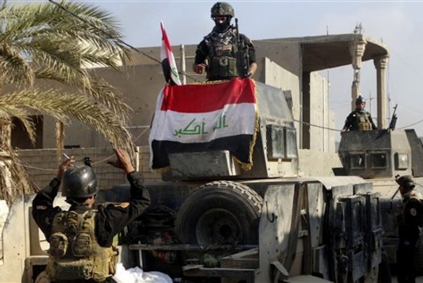 Pasukan Irak menguasai kompleks pemerintahan di Ramadi, Irak, Senin, 28 Desember 2015. ISIS menguasai Ramadi sejak Mei.