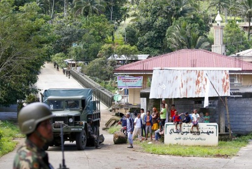Pasukan pemerintah Filipina di Kota Marawi, Filipina, Selasa, 30 Mei 2017. Sepekan terakhir tentara terlibat pertempuran dengan kelompok ISIS.  