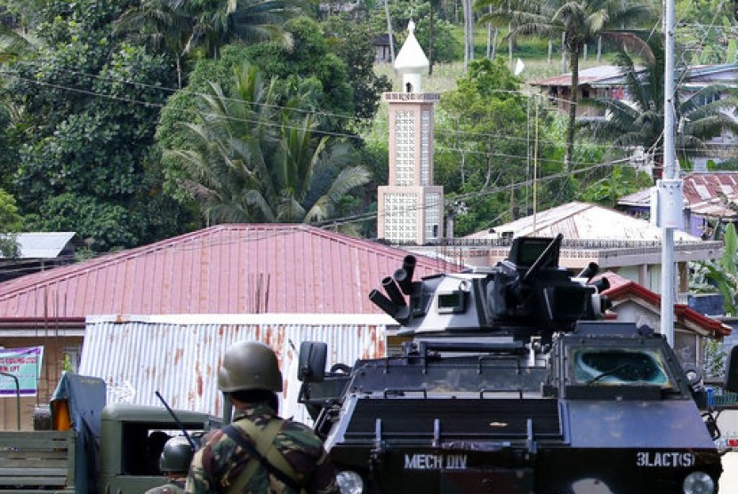 Pasukan pemerintah Filipina di Kota Marawi, Selasa, 30 Mei 2017. Sekitar 61 militan Maute telah tewas dalam pertempuran melawan militer Filipina dalam sepekan terakhir.