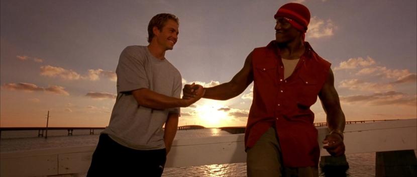 Paul Walker (kiri) dan Tyrese Gibson (kanan) saat bermain dalam film 2 Fast 2 Furious.