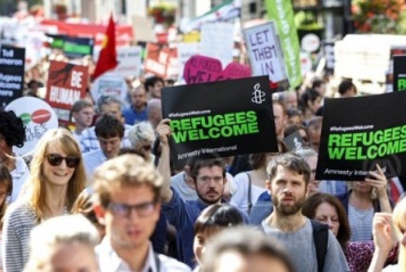 Pawai di Inggris mendukung pengungsi.
