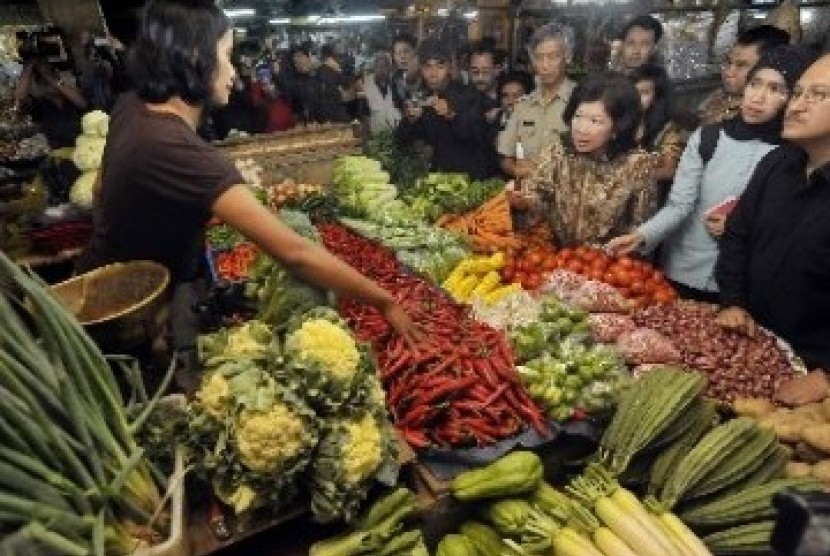 Pedagang sayur mayur di pasar tradisional (ilustrasi). 