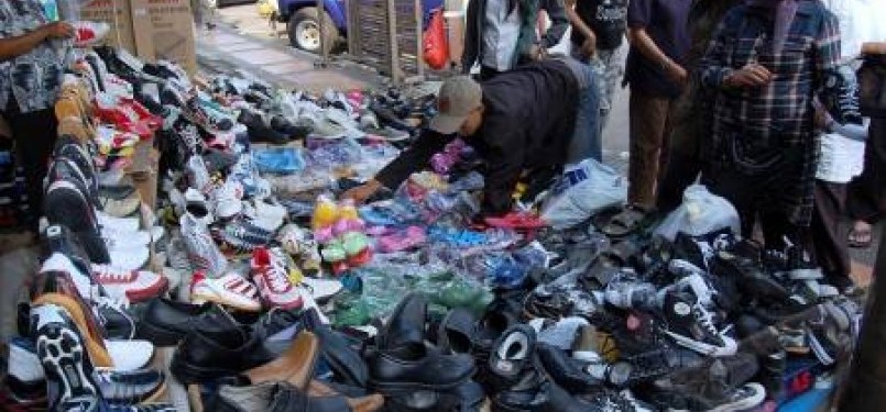 Pedagang sepatu (ilustrasi)