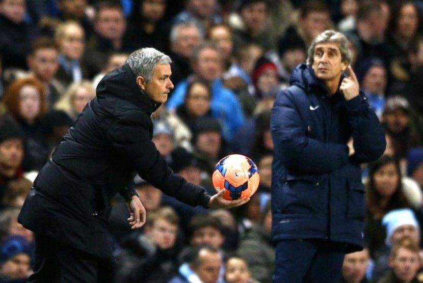 Pelatih Jose Mourinho dan Manuel Pellegrini.