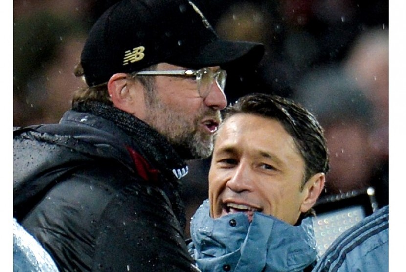 Pelatih Liverpool Juergen Klopp (kiri) dan pelatih Bayern Muenchen Niko Kovac.