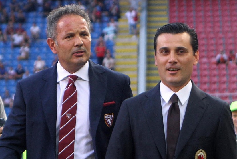 Pelatih Torino, Sinisa Mihajlovic (kiri) dan pelatih AC Milan, Vicenzo Montella pada laga Serie A, di stadion San Siro, 21 Agustus. Dua pelatih ini dianggap berjasa menggenjot prestasi bintang muda Milan.