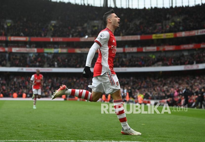 Penyerang Arsenal Gabriel Martinelli saat merayakan gol. 