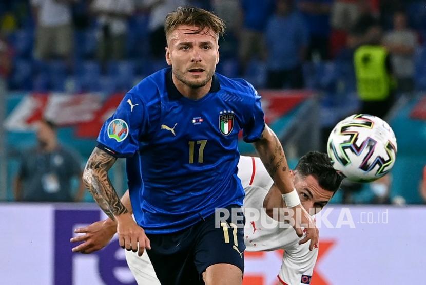 Pemain Italia Ciro Immobile beraksi pada pertandingan grup A kejuaraan sepak bola Euro 2020 antara Italia dan Swiss di stadion Olimpiade di Roma, Kamis (17/6) dini hari WIB.