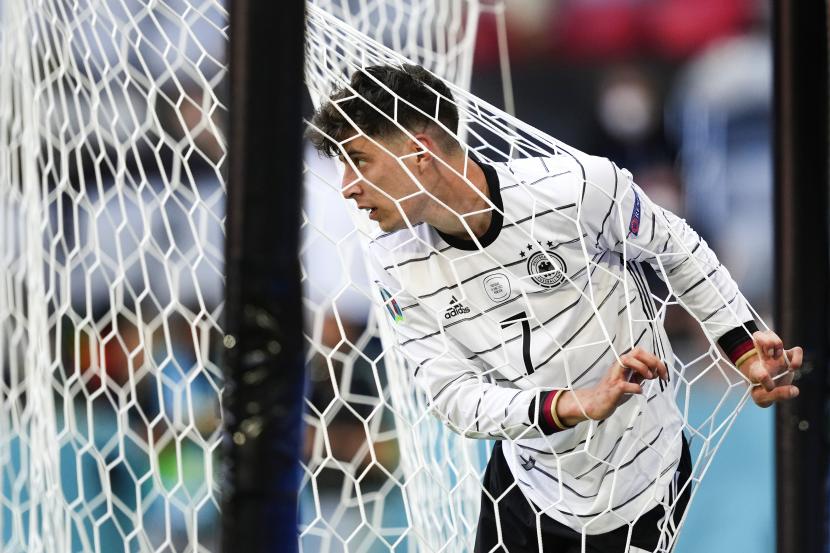 Pemain Jerman Kai Havertz merayakan gol ke gawang Portugal pada pertandingan sepak bola babak penyisihan grup F UEFA EURO 2020 antara Portugal dan Jerman di Munich, Jerman, 19 Juni 2021. 