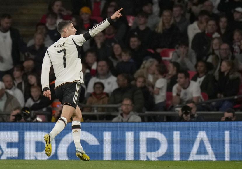 Pemain Jerman Kai Havertz merayakan setelah mencetak gol kedua timnya selama pertandingan sepak bola UEFA Nations League antara Inggris dan Jerman di Stadion Wembley di London, Inggris, Senin, 26 September 2022. 