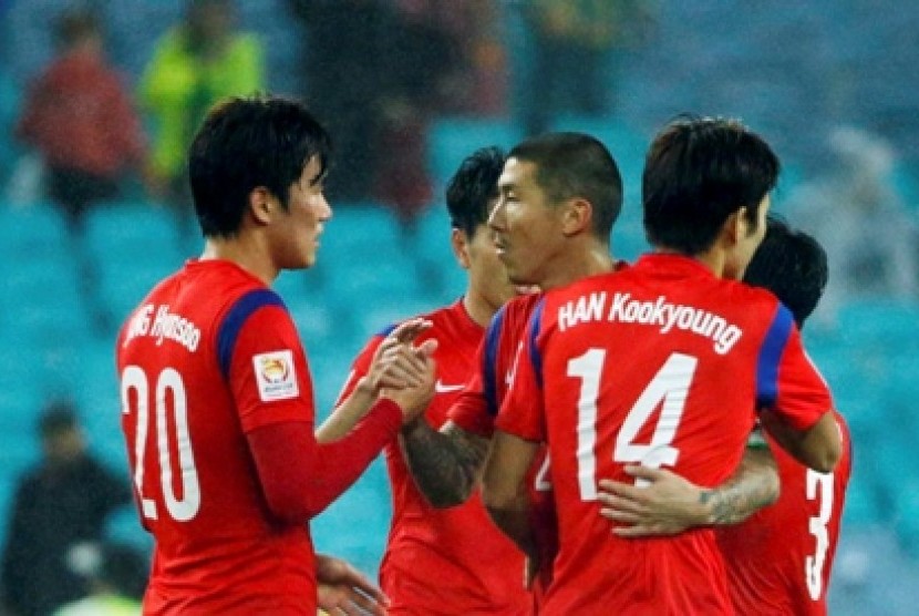 Pemain Korsel merayakan keberhasilan lolos ke final Piala Asia 2015.