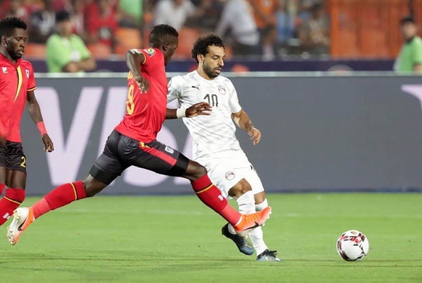 Pemain Mesir Mohamed Salah saat pertandingan melawan Uganda, Senin (1/7) dinihari WIB.
