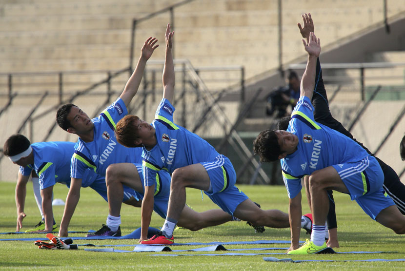 Pemain Timnas Jepang menggelar sesi latihan di Sorocaba, Sao Paulo, Ahad (8/6). 
