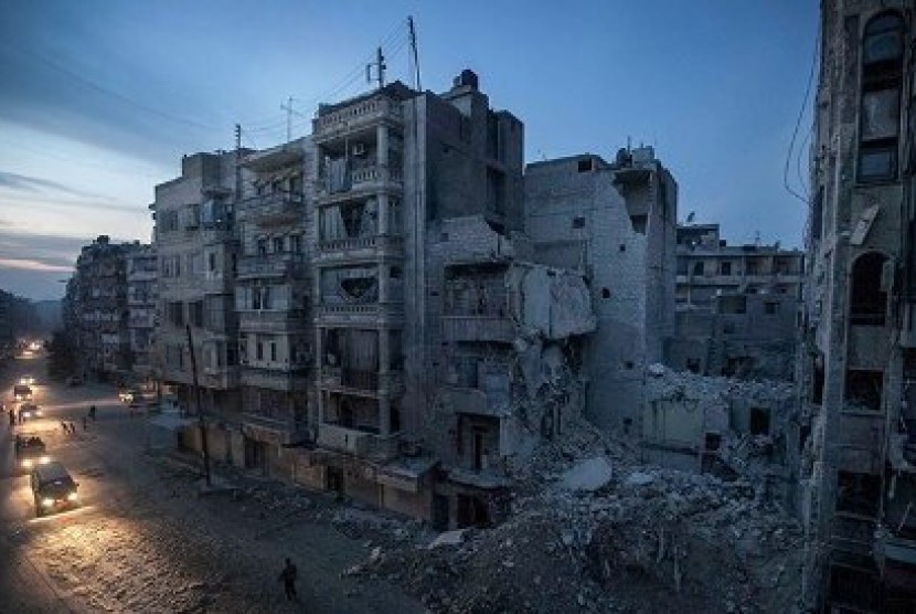 Pemandangan Kota Damaskus dengan bangunan yang hancur akibat pertempuran.