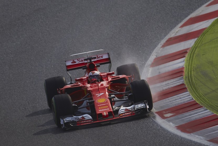 Pembalap Ferrari, Kimi Raikkonen pada tes pramusim F1 di sirkuit Catalunya, Spanyol, Kamis (2/3).