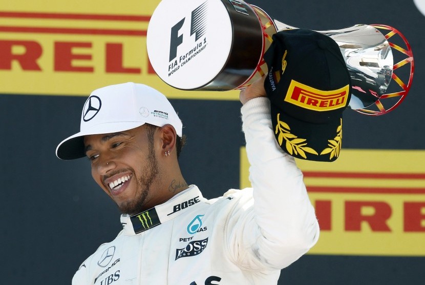 Pembalap Mercedes, Lewis Hamilton menjadi juara GP Spanyol di Sirkuit Catalunya, Barcelona, Ahad (14/5).