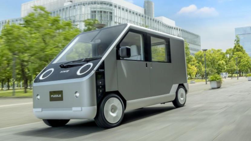 Pembuat mobil asal Jepang HW Electro mengenalkan van kecil bertenaga Surya yang diberi nama Puzzle.