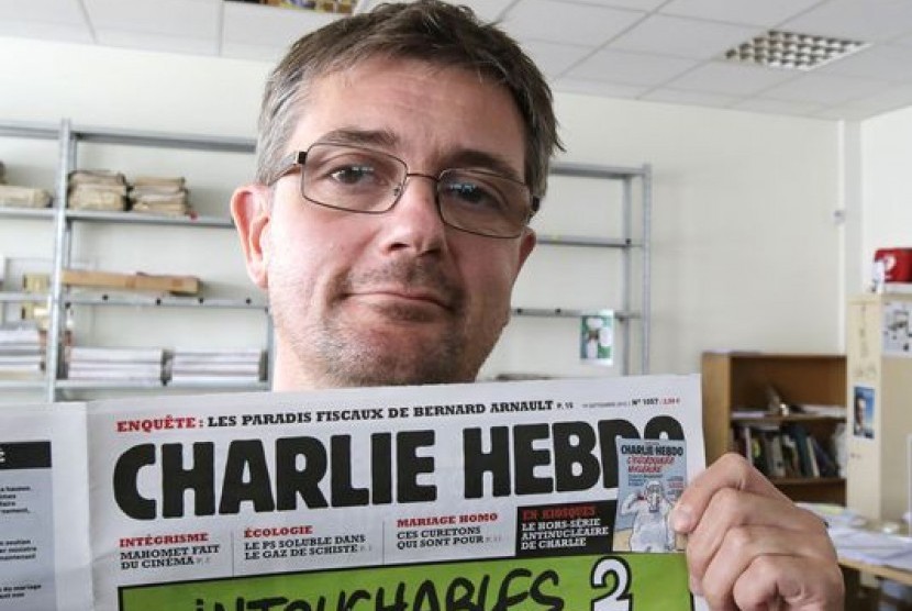 Pemimpin Redaksi Charlie Hebdo, Stephane Charbonnier menjadi korban serangan brutal.