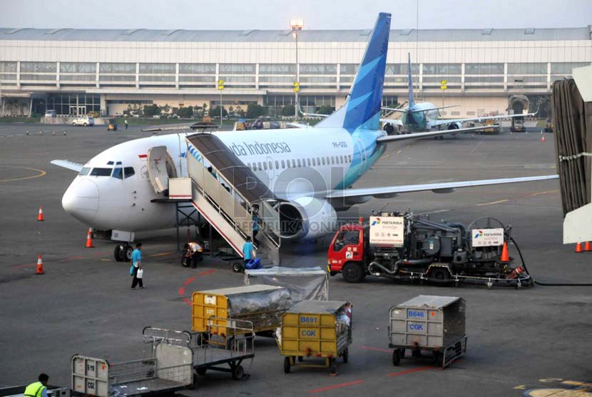Penambahan Kursi Lebaran. Pesawat milik maskapai Garuda Indonesia parkir di Terminal 2 Bandara Internsional Soekarno-Hatta, Banten, Ahad (29/6).