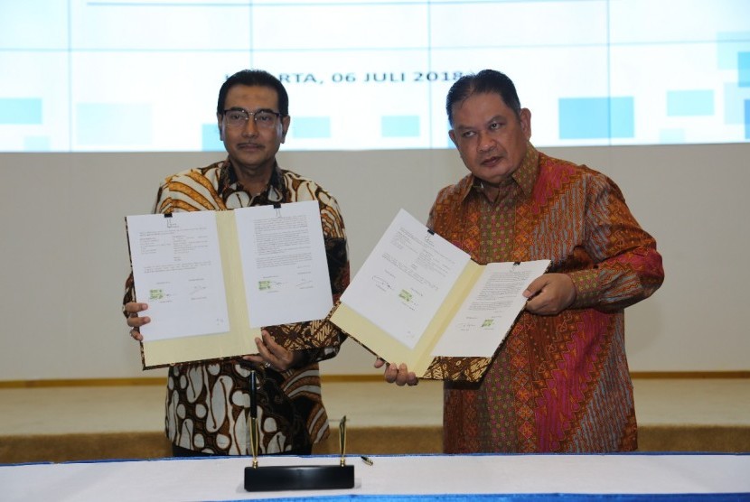 Penandatanganan Kerja Sama Pelayanan Jasa Kustodian yang ditandatangani oleh Direktur Utama PT TASPEN (PERSERO), Iqbal Latanro dan Direktur Utama PT BANK RAKYAT INDONESIA (PERSERO), Tbk, Suprajarto.